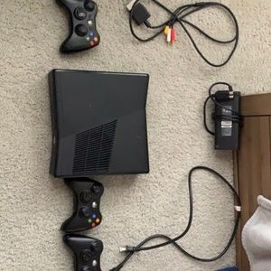 Xbox 360, controllers, and all wires.